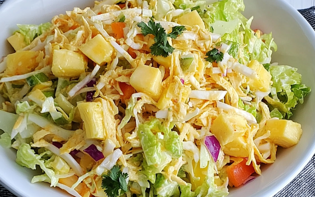 Creamy canned pineapple coleslaw with crunchy cabbage and juicy pineapple chunks, the perfect 5-minute BBQ side dish